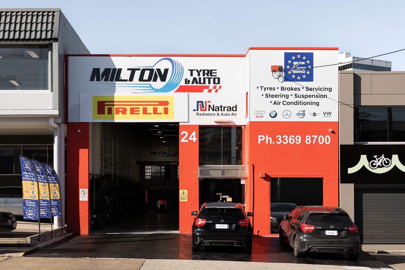 Milton Tyres & Auto Garage with cars parked out front - European Car Servicing Milton