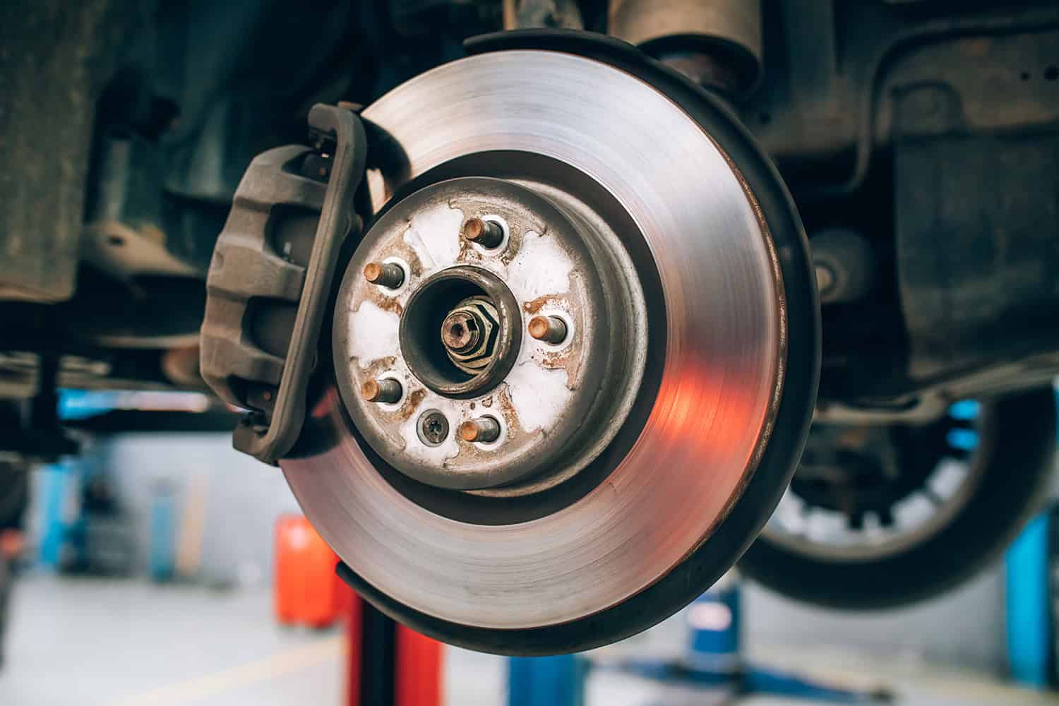 Close up of car disc brake during the brake repair